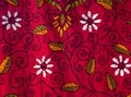 Fragment of colorful retro tapestry textile pattern with floral ornament useful as background Royalty Free Stock Photo