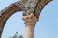 Fragment of a column in ruins of Kursi - a large Byzantine 8th-century monastery on the shores of Lake Tiberias, on the Golan Heig