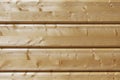 Fragment of a construction built of glued pine timber beams. Royalty Free Stock Photo