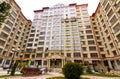 Fragment of the courtyard and the facade of a multistory building under construction Royalty Free Stock Photo