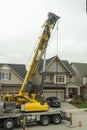 Fragment of a crane with a raised boom