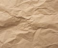 Fragment of crumpled blank sheet of brown wrapping kraft paper