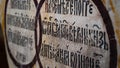 Fragment of the Cyrillic Old Slavic letter on the wall in the temple. Selected focus