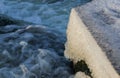 Water Cascading over Weir Step in river canal. Royalty Free Stock Photo