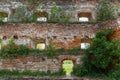 Fragment of defense stone and brick wall of mediaeval castle