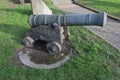 The defensive wall and a old cannon from year 1649 in the city of New Ross Co. Wexford, Ireland. Royalty Free Stock Photo
