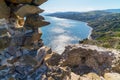 A fragment of the destroyed defensive wall of the fortress on the seashore of the Crimea