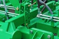 A fragment of the details of the mechanism of agricultural machinery close-up / abstract industrial technology background