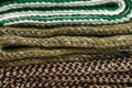 Fragment drains of knitted scarves folded on top of each other Royalty Free Stock Photo