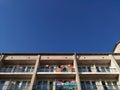 Fragment of the facade of the building, blue sky Royalty Free Stock Photo