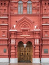 Fragment of the facade and the main entrance of an old building of the 19th century. State historical museum on the Red Square in Royalty Free Stock Photo