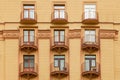 Fragment of the facade of a modern building with metal balconies and a geometric pattern Royalty Free Stock Photo