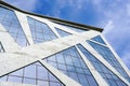 A fragment of the facade of a modern design glass and concrete building Royalty Free Stock Photo