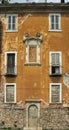 Fragment of the facade of an old house. Royalty Free Stock Photo