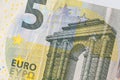 fragment of five Euro bill. 5 euro banknote close-up. Royalty Free Stock Photo