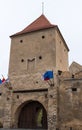 Fragment of the fortress wall with the entrance gates of Rupea Citadel built in the 14th century on the road between Sighisoara an