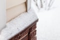 Fragment of the foundation of a country house in the snow Royalty Free Stock Photo