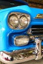 A fragment of the front of the car close-up. Headlight and bumper of the car Royalty Free Stock Photo