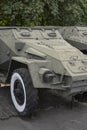 A fragment of the frontal armor of an armored personnel carrier with grille elements