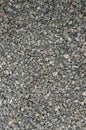 Fragment of garden path. Loose gravel. Gray small stones