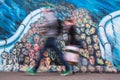 Fragment of graffiti on Berlin Wall at East Side Gallery and now is largest world graffiti gallery. Royalty Free Stock Photo