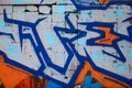 Fragment of an old wall with colorful graffiti painting Royalty Free Stock Photo