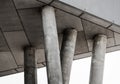 Fragment of gray concrete building with columns Royalty Free Stock Photo