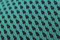 Fragment of green sneaker fabric. Royalty Free Stock Photo