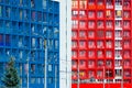 A fragment of a half blue and half red residential building Royalty Free Stock Photo