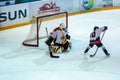 A fragment of the hockey penalty shot performed by the young hockey player