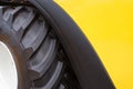 A fragment of a huge wheel and tire of construction equipment. Royalty Free Stock Photo
