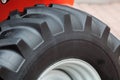 A fragment of a huge wheel and tire of construction equipment. Royalty Free Stock Photo