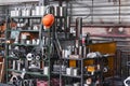 Fragment of industrial interior with a storage of metal products and tools in the workshop Royalty Free Stock Photo
