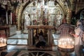 Fragment of the interior of the Church of the Holy Sepulchre in Jerusalem, Israel. The Believer touches Golgotha. Royalty Free Stock Photo