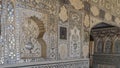 A fragment of the interior decoration of the mirror palace of the ancient Amber Fort. Royalty Free Stock Photo