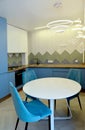 Fragment of the interior of a modern kitchen in blue tones Royalty Free Stock Photo