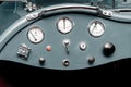 Fragment of interior retro car with speedometer, toggle switches. vintage style Royalty Free Stock Photo