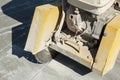 Fragment of a joint cutter machine on a brushed concrete surface Royalty Free Stock Photo