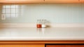 Fragment of kitchen interior in pastel colors mid-century style. Empty counter top with jars with spices drawers cupboards