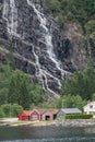 Fragment of the Kvernosfossen waterfall on a cloudy day. Hordaland country, Norway, Europe.