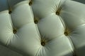 A fragment of a leather-covered sofa in close-up Royalty Free Stock Photo