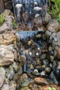 Fragment of man-made waterfall in the Park of the monastery Kopan, Kathmandu, Nepal.