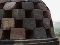 Fragment of masonry stupa Borobudur Temple on the Indonesian island of Java.