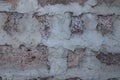 Fragment of masonry wall of the house of cinder block, one stone thick.