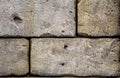 A fragment of a masonry wall made of large blocks