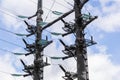 Fragment of massive dual power transmission line support Royalty Free Stock Photo