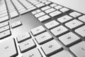 Fragment of metal computer keyboard. Smal depth of focus Royalty Free Stock Photo