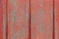 A fragment of a metal fence, sun-bleached paint, creates a kind of unique color and background for design work.