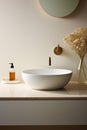 Fragment of minimalist bathroom with white wall, Terrazzo stone countertop, white sink, wall mounted faucet, elegant