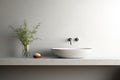 Fragment of minimalist bathroom with white wall, Terrazzo stone countertop, white sink, wall mounted faucet, elegant